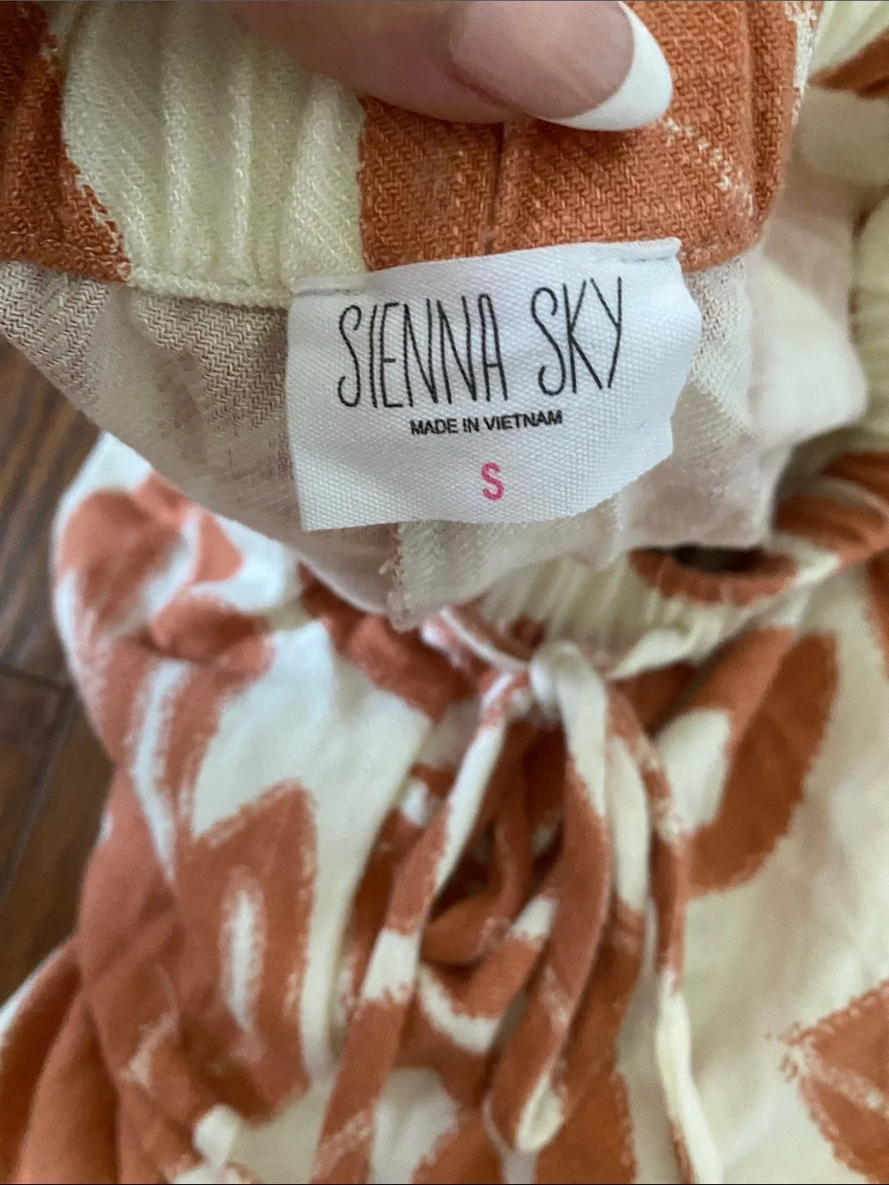 Sienna Sky Cream and Orange Floral Wide-Leg Pants